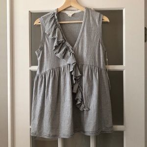 Sleeveless ruffle vneck top